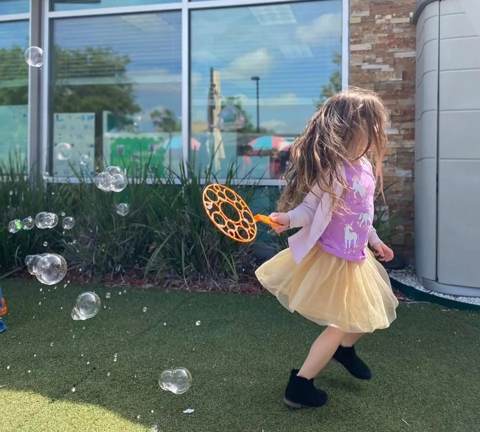 Child with bubbles at Inspireplayground
